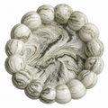 A round decorative tray made of polished green-and-white marbled stone, with a raised border of rounded segments around the edge, shown on a plain white background.